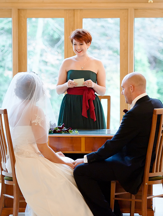 Amber and Craig sat hand in hand during their ceremony at this beautiful barn wedding venue