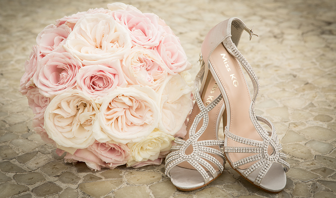 The brides silver Miss KG wedding shoes matched her beautiful bouquet perfectly