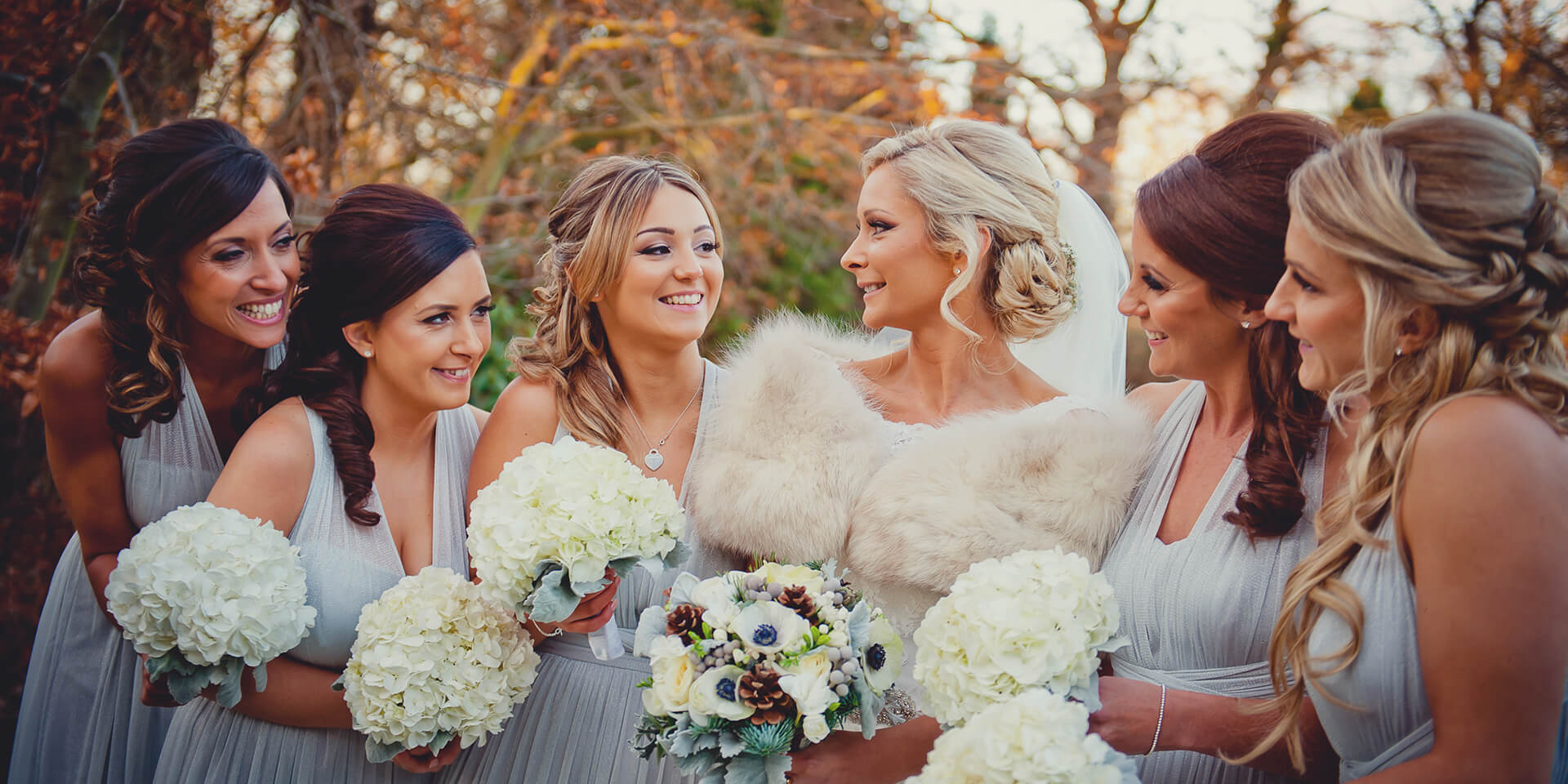 The bride wore a fur shawl to keep warm during her winter wedding at one of Hampshire's finest wedding venues