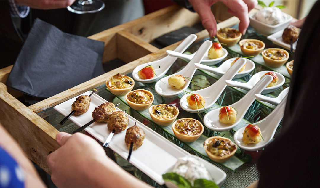 A selection of canapes including curried lamb skewers, warm tartlets and deep-fried Thai fishcakes were served