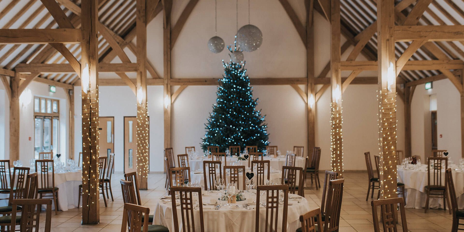 A Christmas tree in the Dining Barn makes it the perfect setting for a winter wedding
