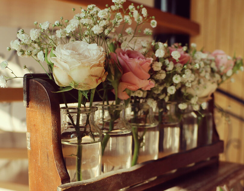 Decorative flower jars matched the bride’s bouquet perfectly keeping with the colour scheme