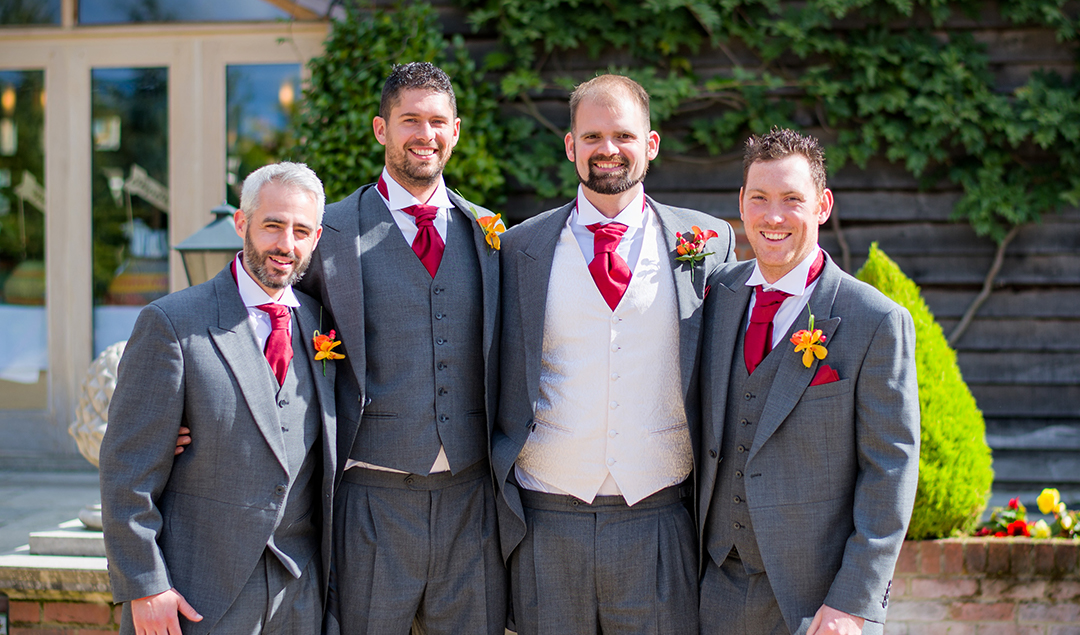 The groom and his groomsmen looked dapper in their suits posing outside the beautiful Hampshire venue