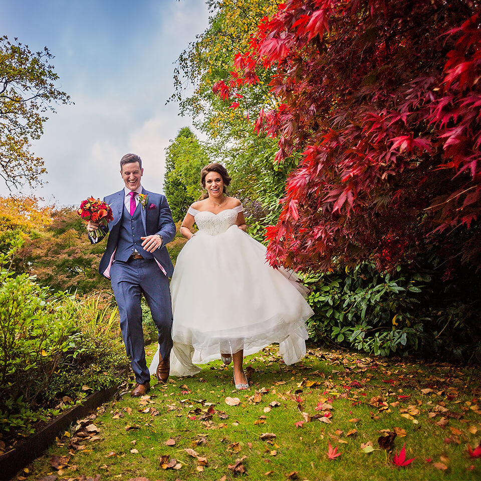A stunning shot of Daniela and James in the gorgeous gardens of Rivervale Barn wedding venue