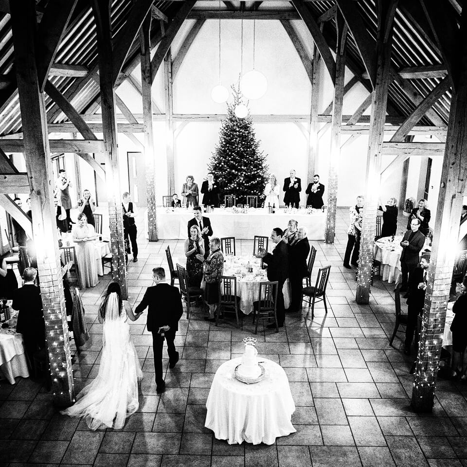 The newlyweds entered the winter themed Dining Barn hand in hand