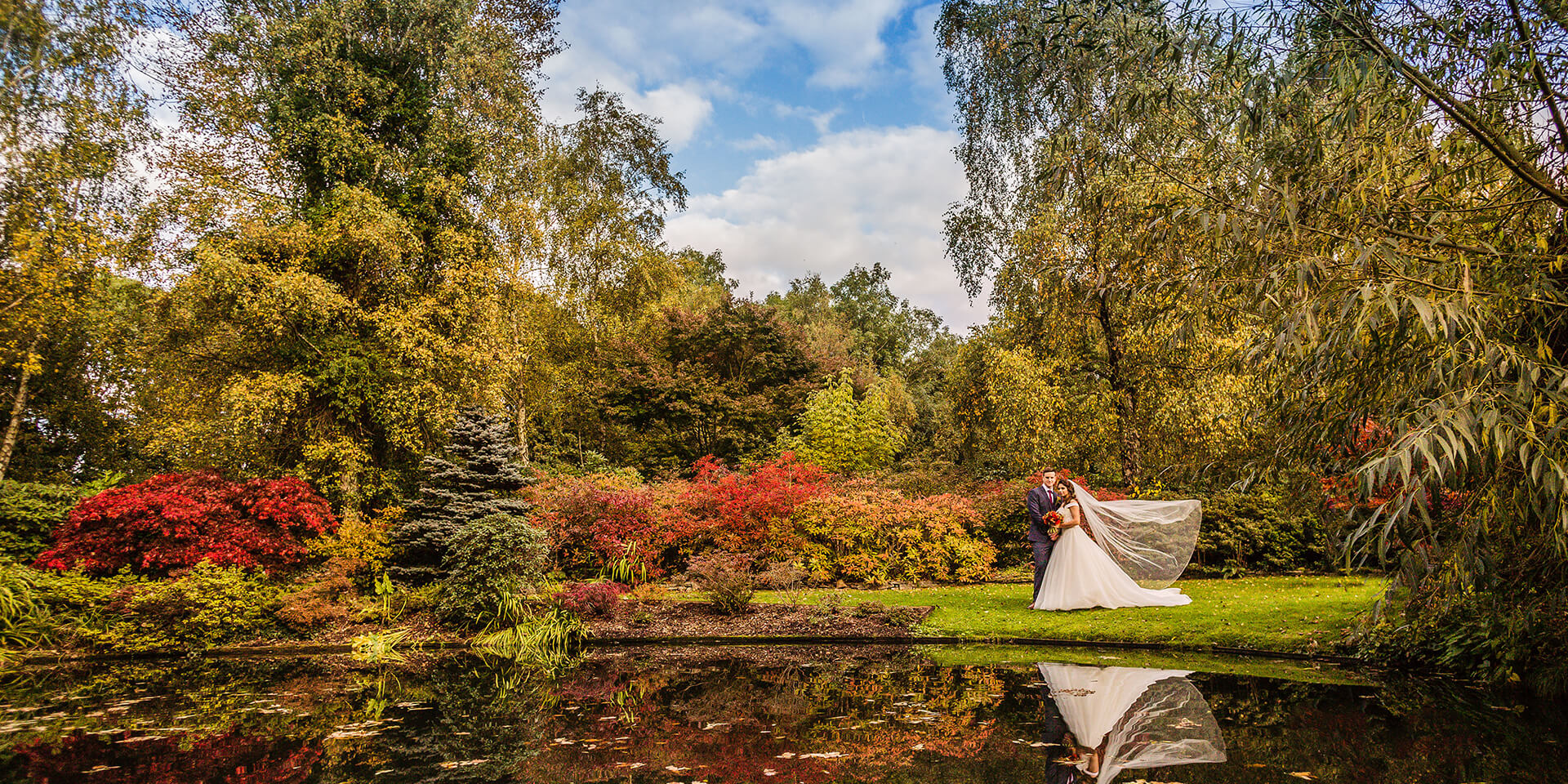 The gardens at Rivervale Barn make a beautiful autumn wedding background