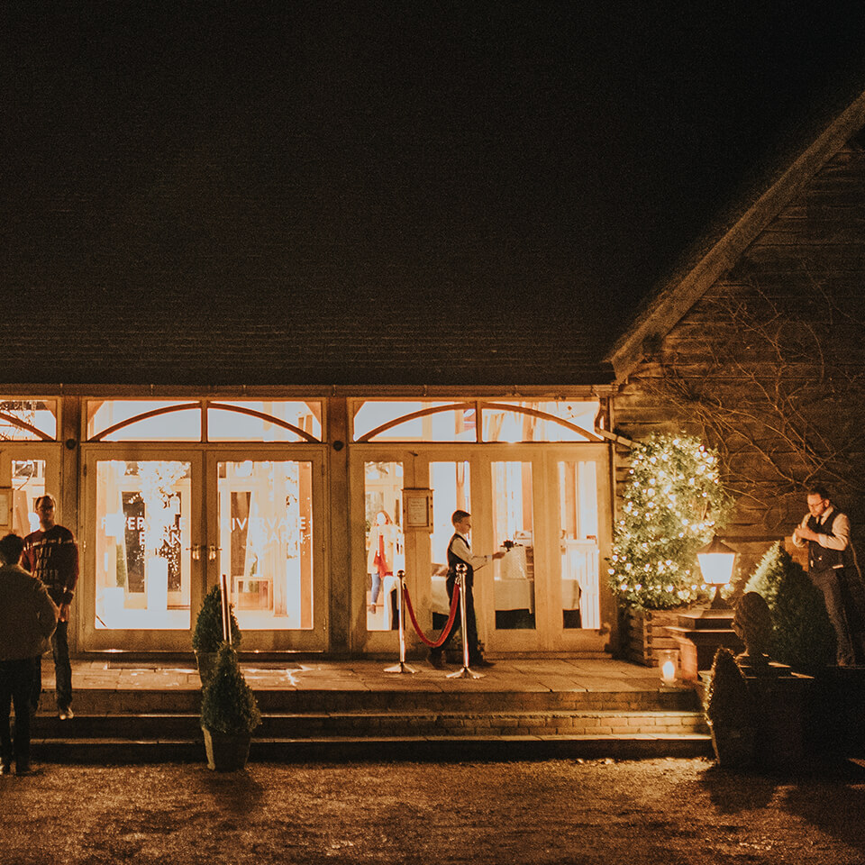 Guests relaxed outside this beautiful Hampshire wedding venue during the evening reception