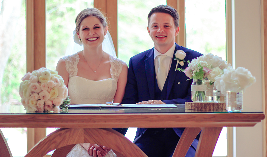 The bride and groom wed in a stunning barn wedding venue in the Hampshire countryside