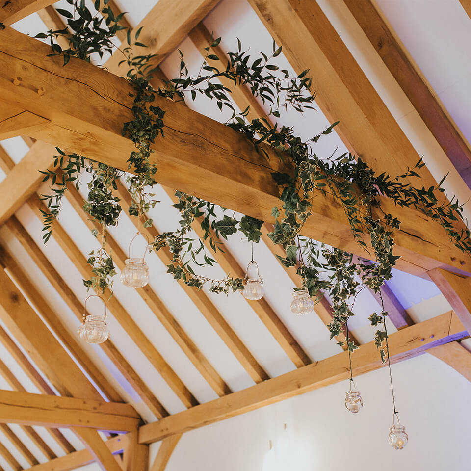 Wedding décor in the Dining Barn at this Hampshire wedding venue