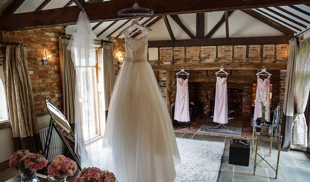 The bride wore a fabulous full-bodied dress while the bridesmaids were in a simple and sophisticated pale pink dress