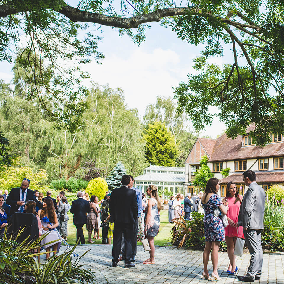 Guests enjoyed Rivervale Barn's beautiful gardens in all their glory during the summer wedding