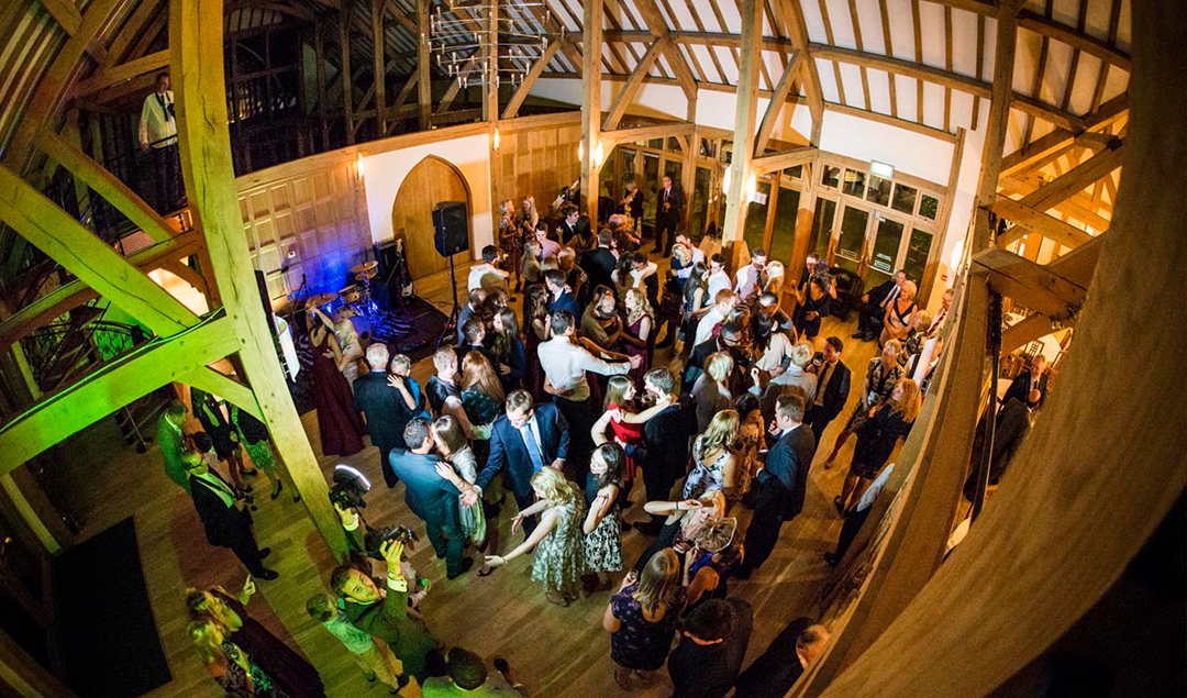 The wedding guests enjoyed the dance floor at this Hampshire barn wedding venue