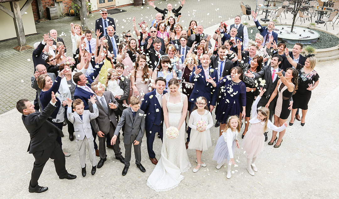 Jen and James’ friends and family gathered outside to the courtyard for a group photo at Rivervale Barn