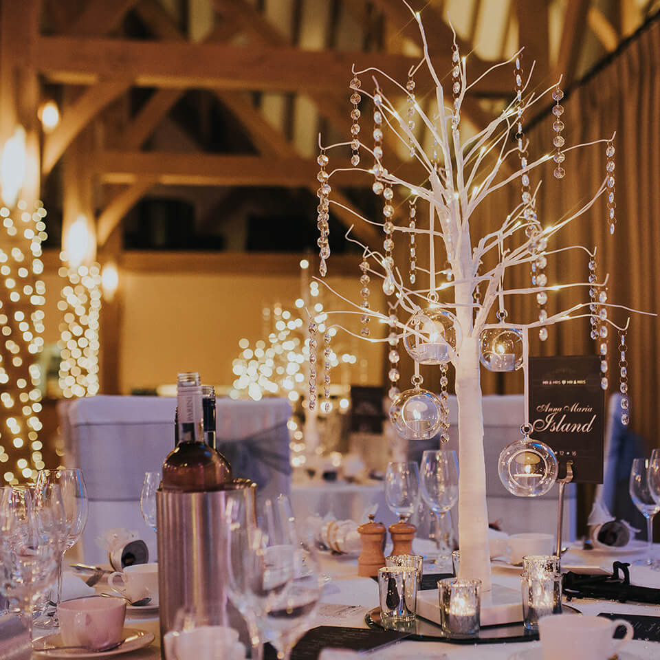 Beautiful wedding themed table décor was placed on the tables at this beautiful wedding venue in Hampshire