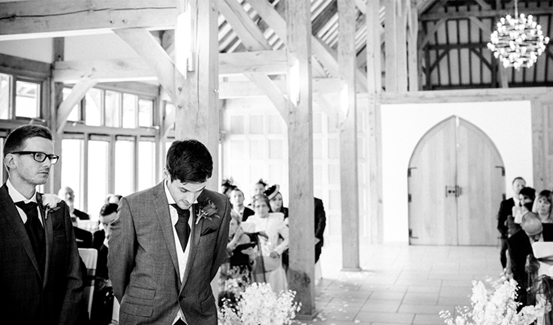 The stunning Ceremony Barn at Rivervale Barn makes for a tear-triggering bridal entrance
