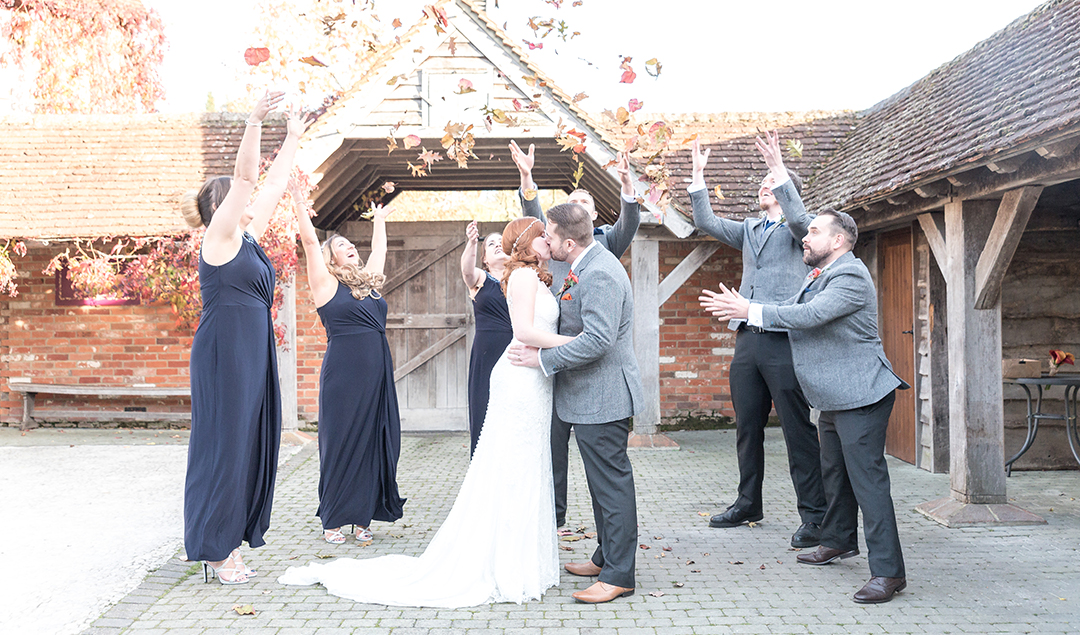 Bring nature in to your autumn wedding photos with rich orange toned leaves