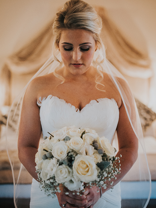 The bride looked beautiful ready for her entrance down the aisle in the ceremony barn