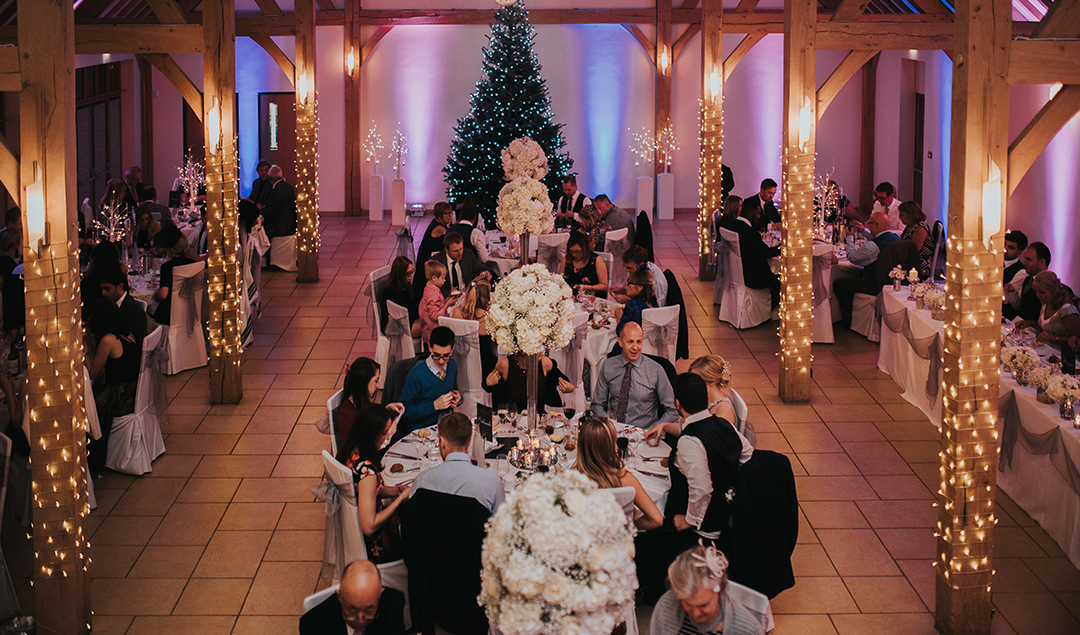 The Christmas tree stood tall during the wedding breakfast at this enchanting winter wedding