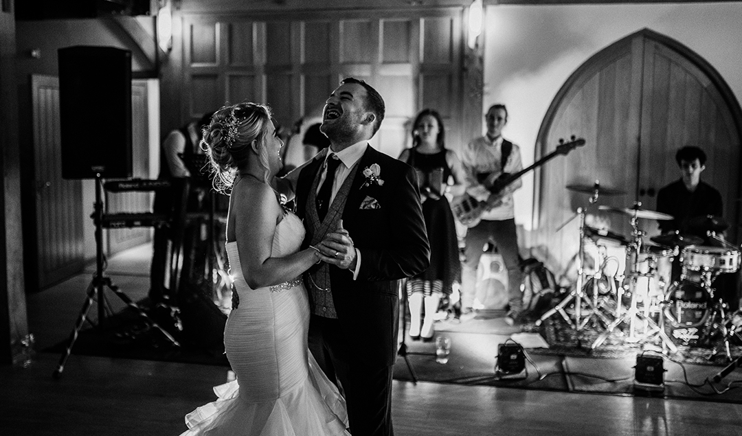 The newlyweds had their first dance in front of family and friends to a live band