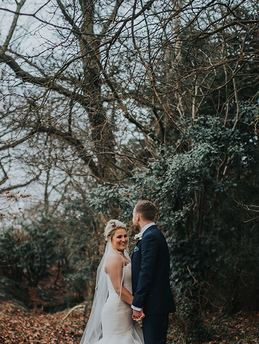 The bride and groom fell in love with this barn wedding venue in Hampshire for their Christmas themed wedding