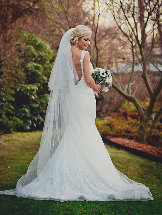 the bride looked stunning in her floor length bridal gown complete with white bouquet
