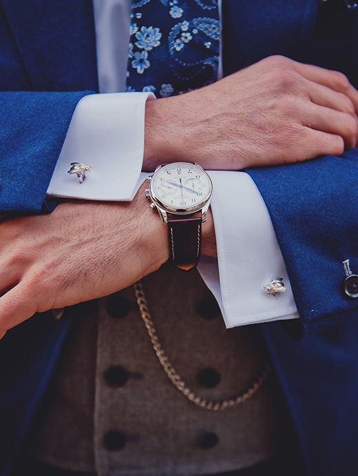 a watch complimented the groom’s three-piece suit perfectly