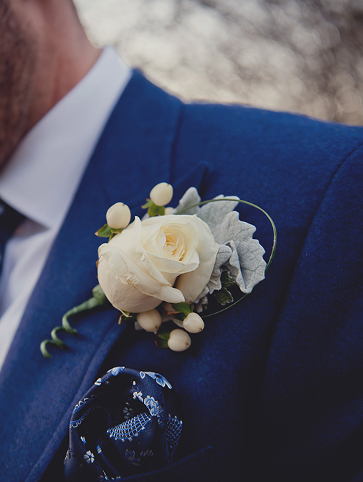 the groom matched his accessories to the bride’s bouquet