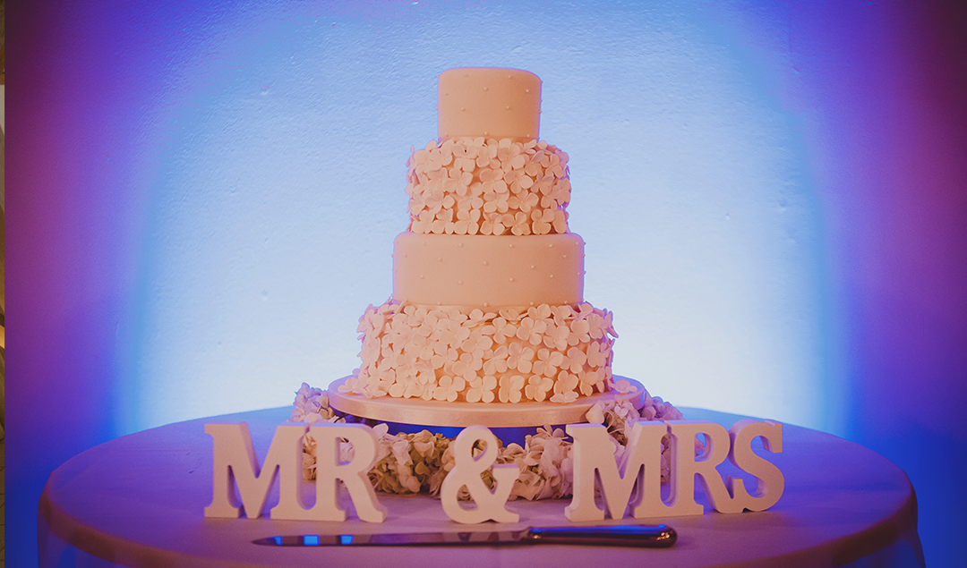 this classic white wedding cake matched the theme of the wedding perfectly