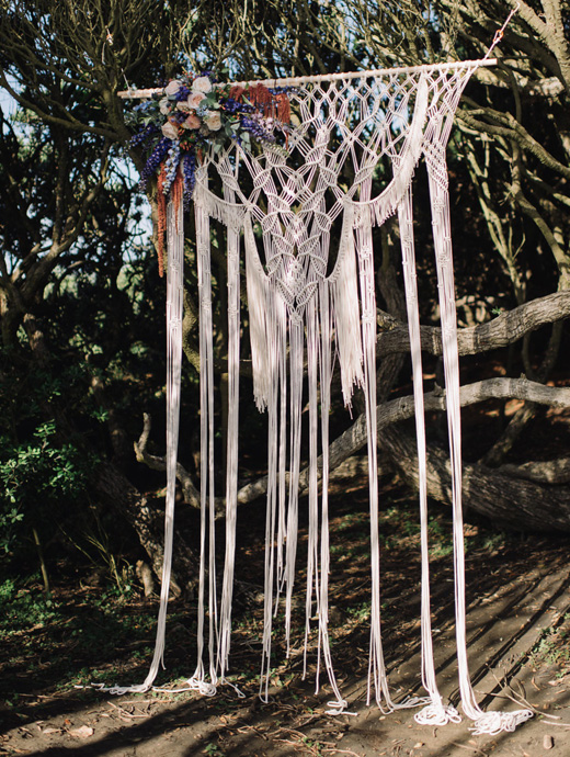 this wedding arch made from string is the perfect addition to any bohemian wedding