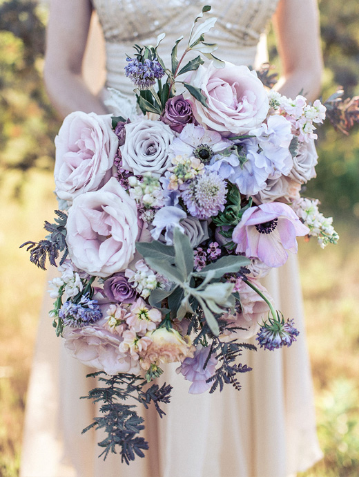 a blend of lavender, blue and grey combine to make this breath taking summer bouquet
