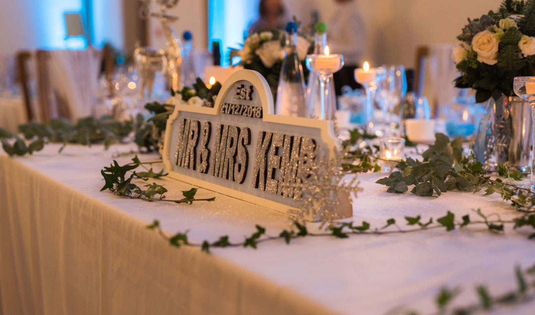 Personalised silver sign to add to their winter wedding decor